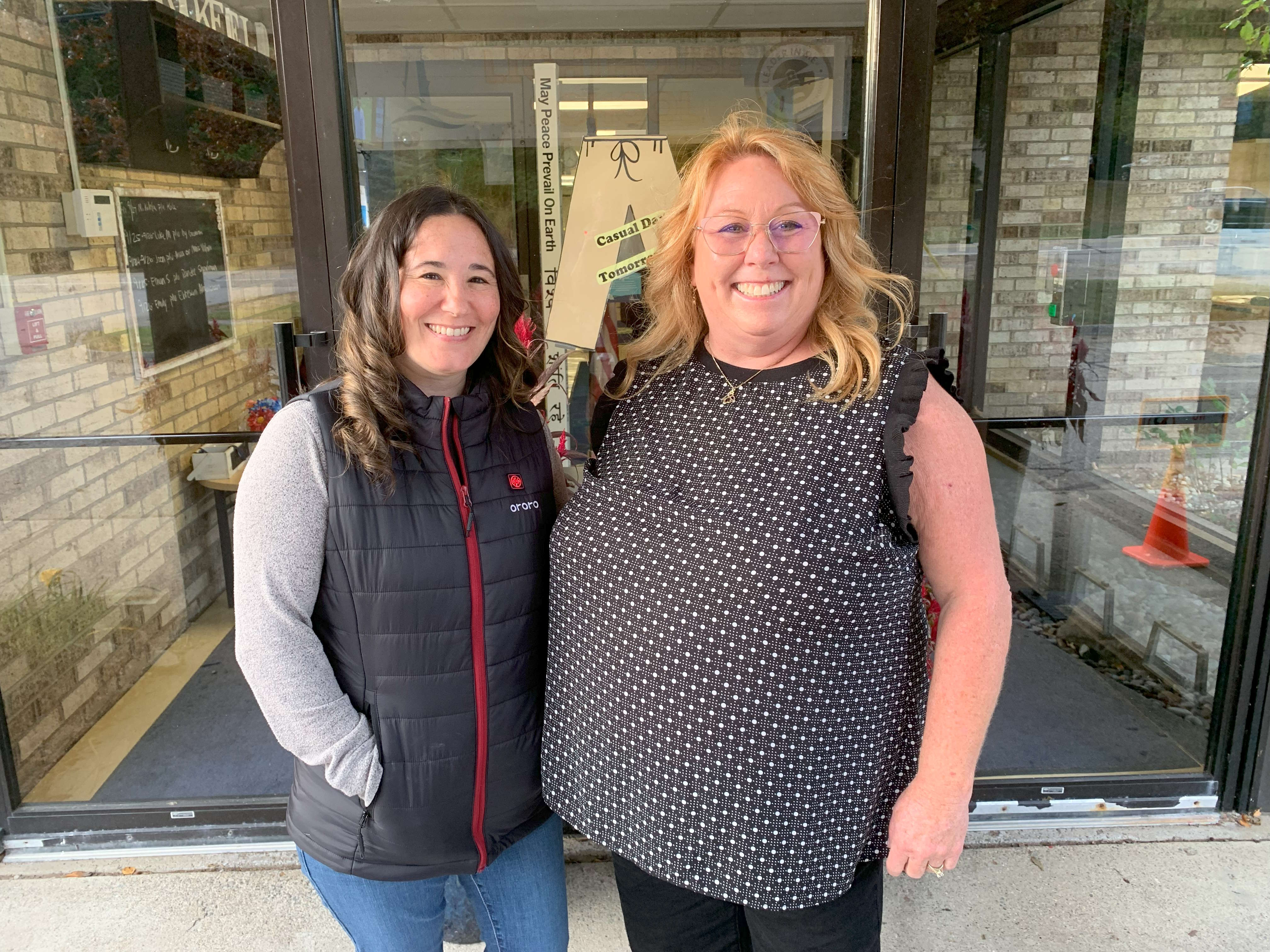 Teacher with young child